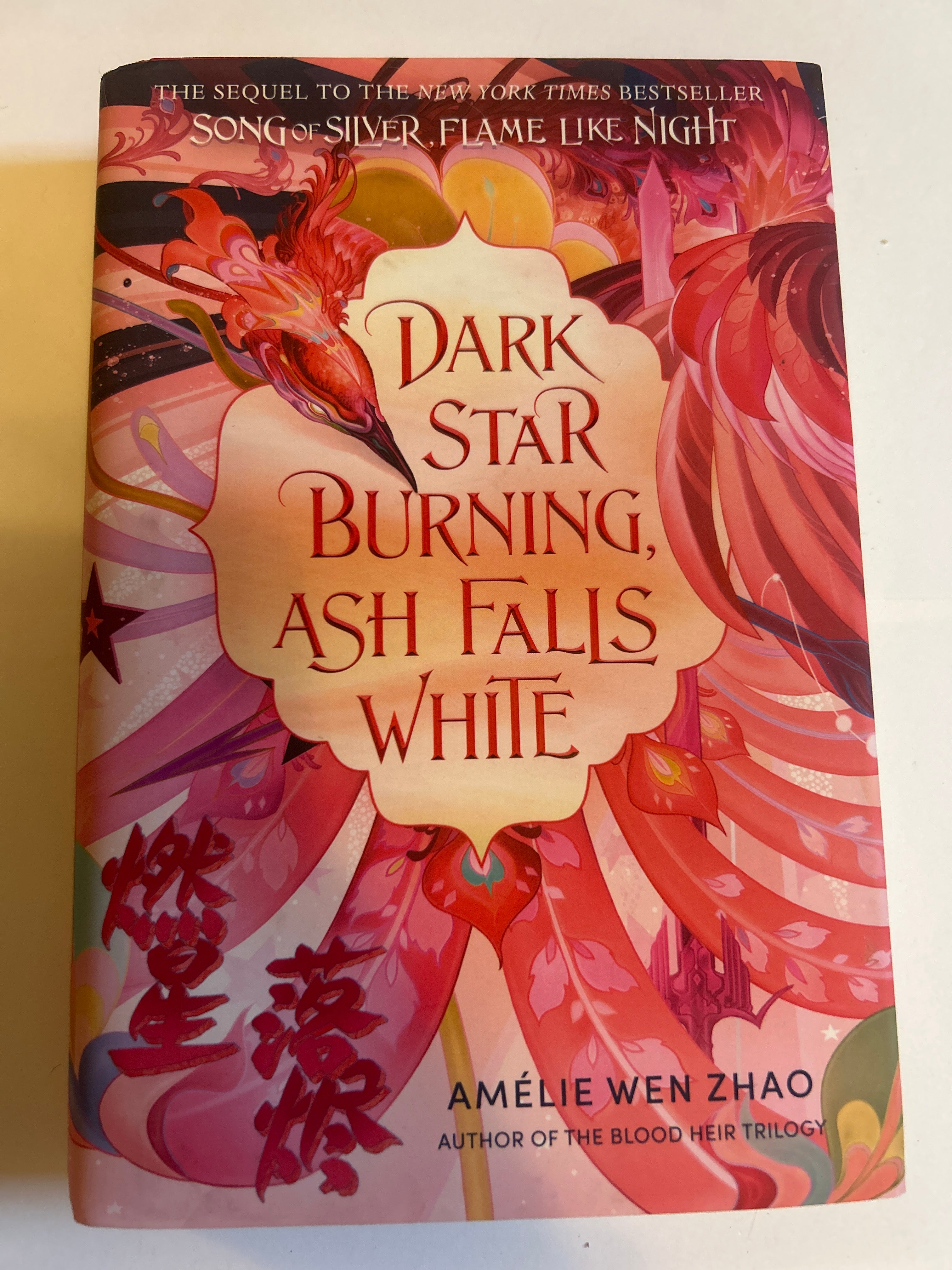 Dark star burning ash falls white -Amèlie wen zhao